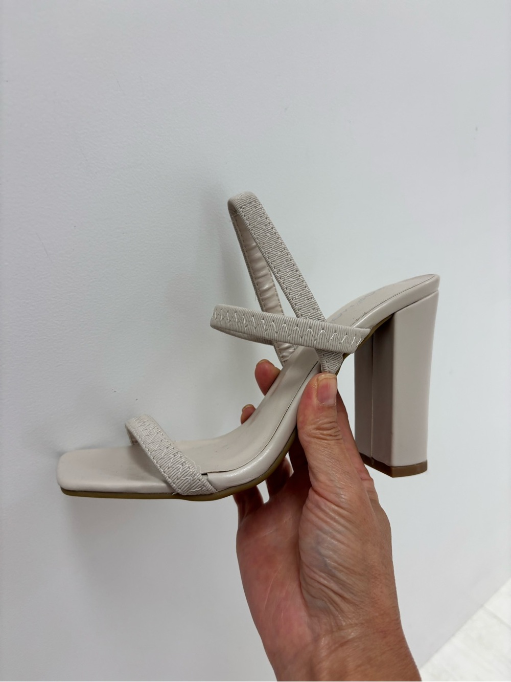 Bone stacked strappy heel